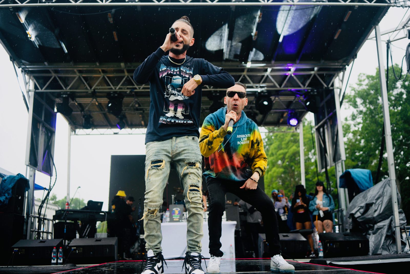 KING T and LUSS performing together on stage