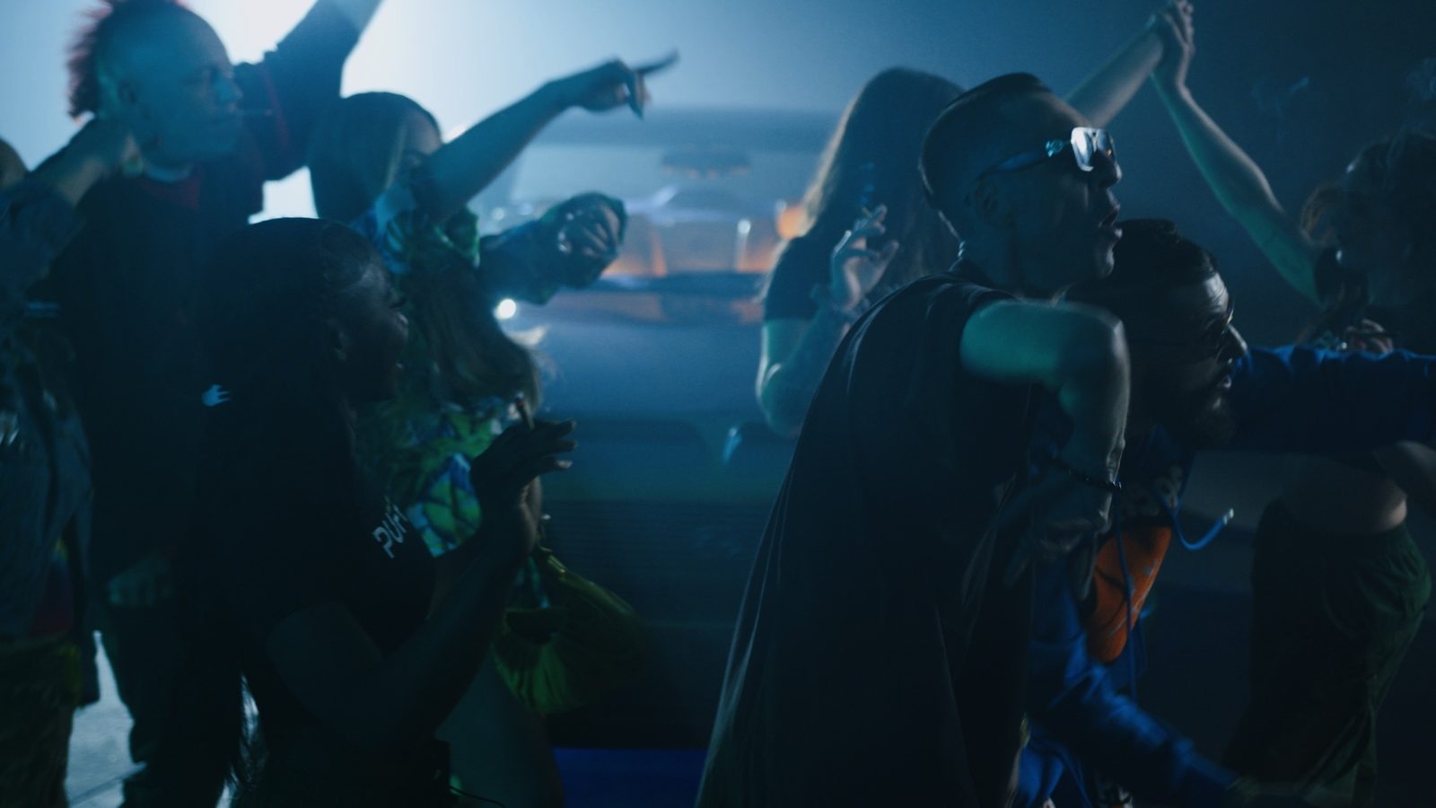 A dancing crowd in a music video